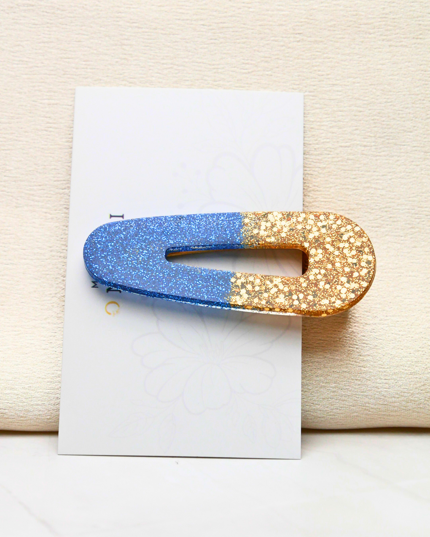 Barrette paillettes bleues et dorées